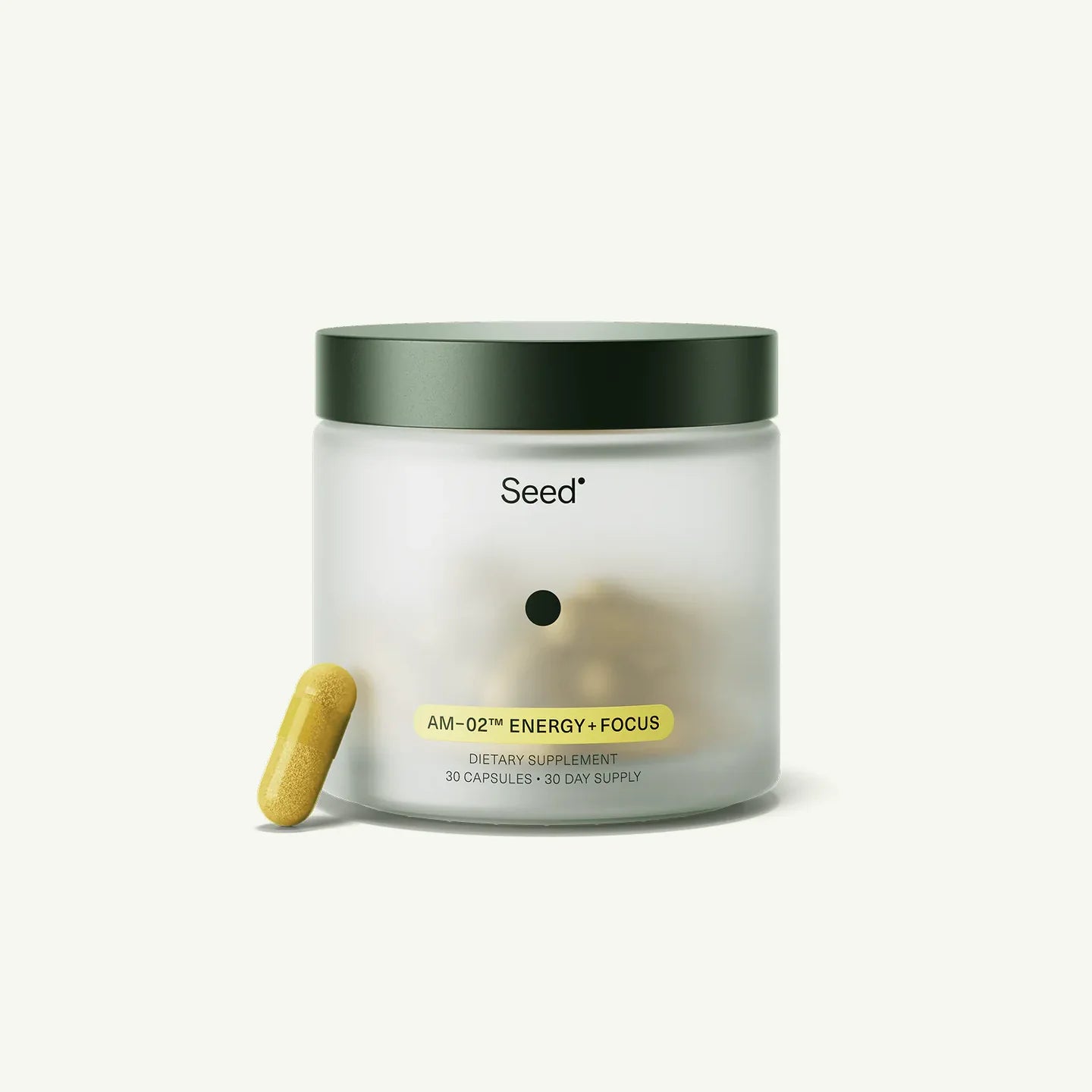 Container of 'Seed' supplements on a desk with a blurred background